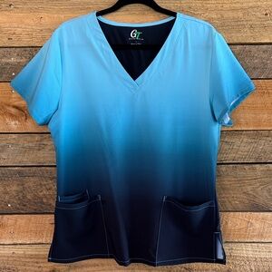 GT Performance Blue Tie Dye Scrub Top with Pockets Size L in Like New Condition